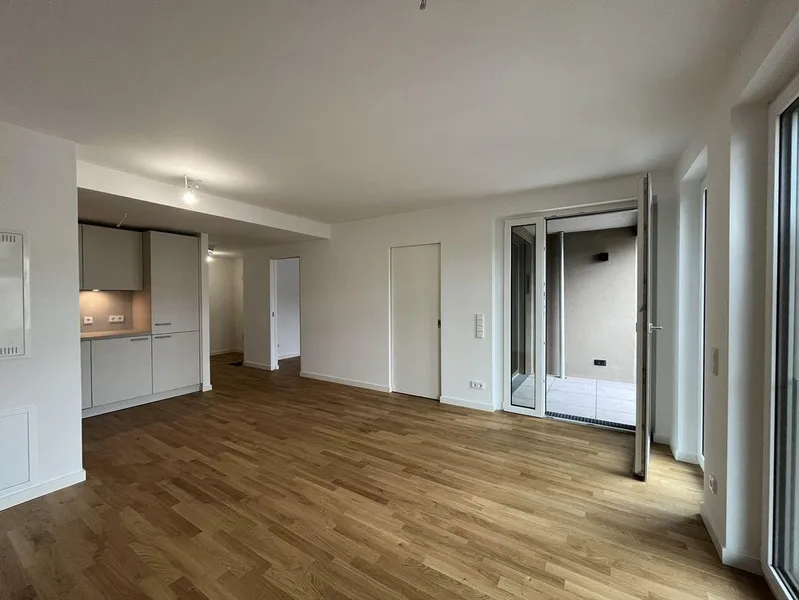 Erstbezug im Neubau! Moderne 2-Zimmer Wohnung mit QNG-Plus Siegel und Einbauküche! — photo 1